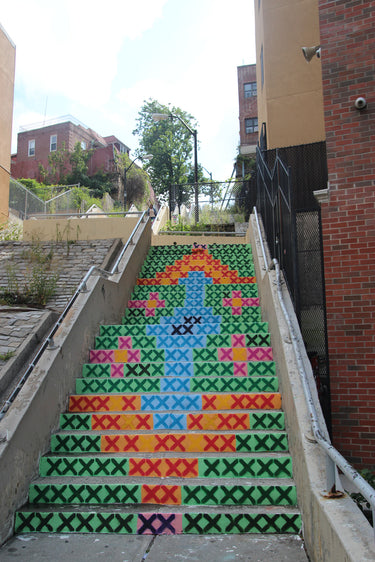 Artwork mural on stairs located in Bronx, NY